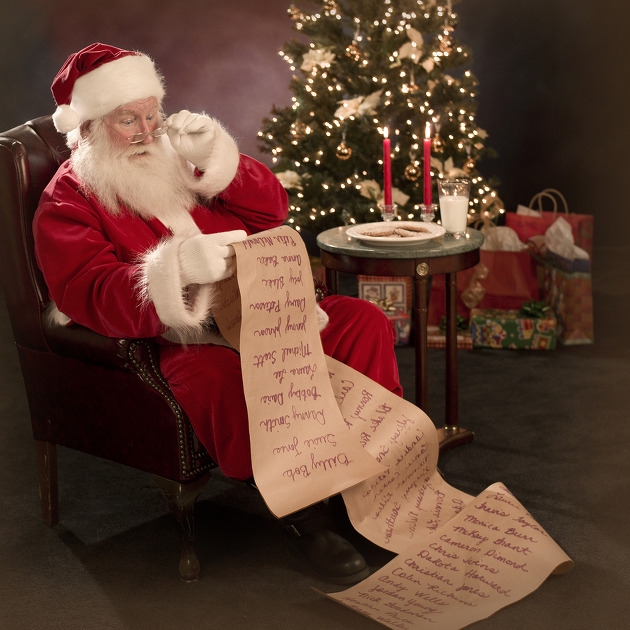 bigstock-Santa-Reading-Christmas-Wish-L-878150.jpg